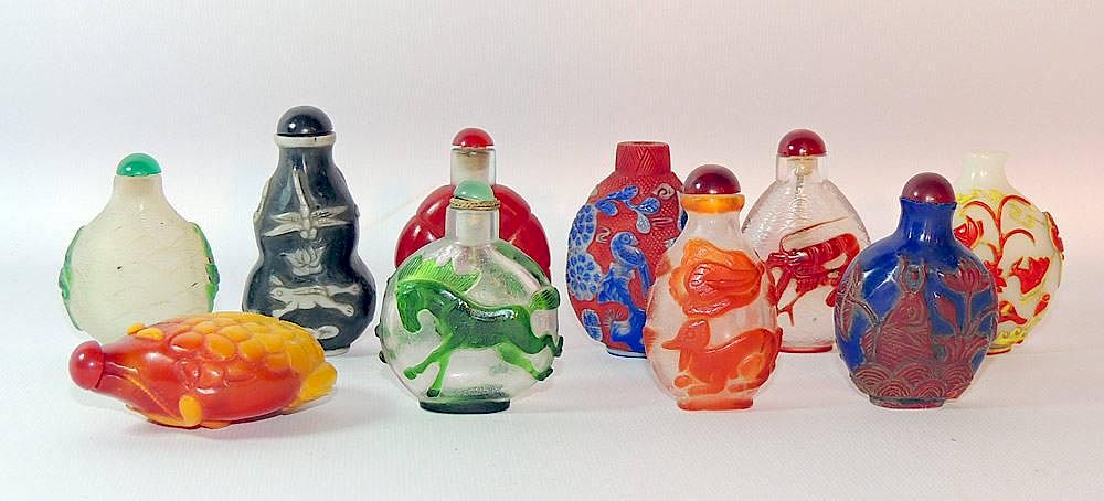 Appraisal: Ten Peking Glass Snuff Bottles Ten Peking glass snuff bottles