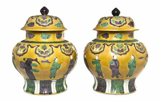 Appraisal: A Pair of Sancai Glazed Baluster Jars each with piped