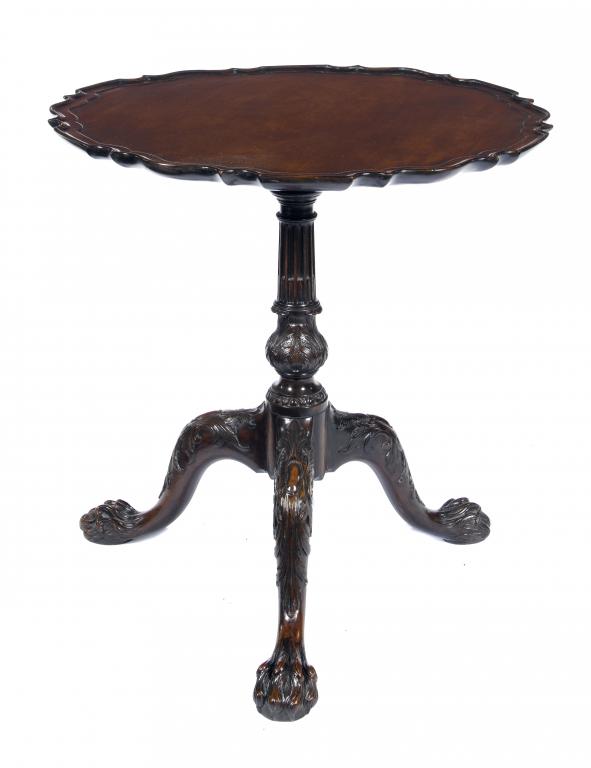 Appraisal: A VICTORIAN MAHOGANY TRIPOD TABLE the figured and moulded circular