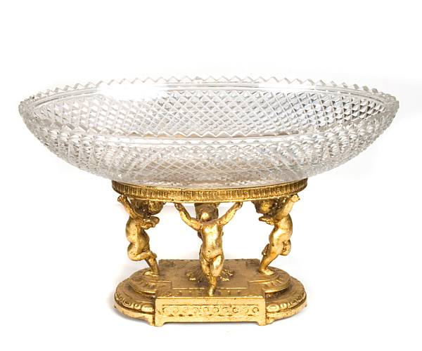 Appraisal: A gilt bronze and cut crystal centerpiece height in width