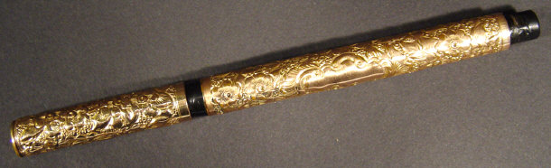 Appraisal: Edwardian gold plated fountain pen the case and lid embossed