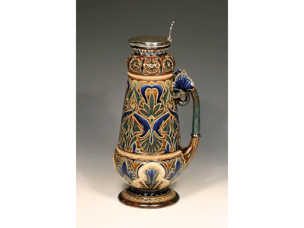 Appraisal: A DOULTON LAMBETH EWER with all over incised floral decoration