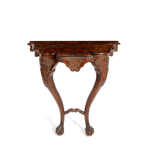 Appraisal: AN ANTIQUE WALNUT CONSOLE TABLE with a shaped serpentine top