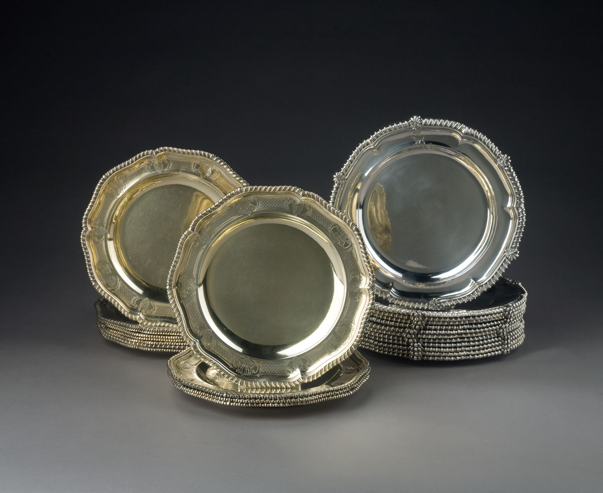 Appraisal: SET OF TWELVE GEORGE II AND III SILVER-GILT CRESTED DINNER