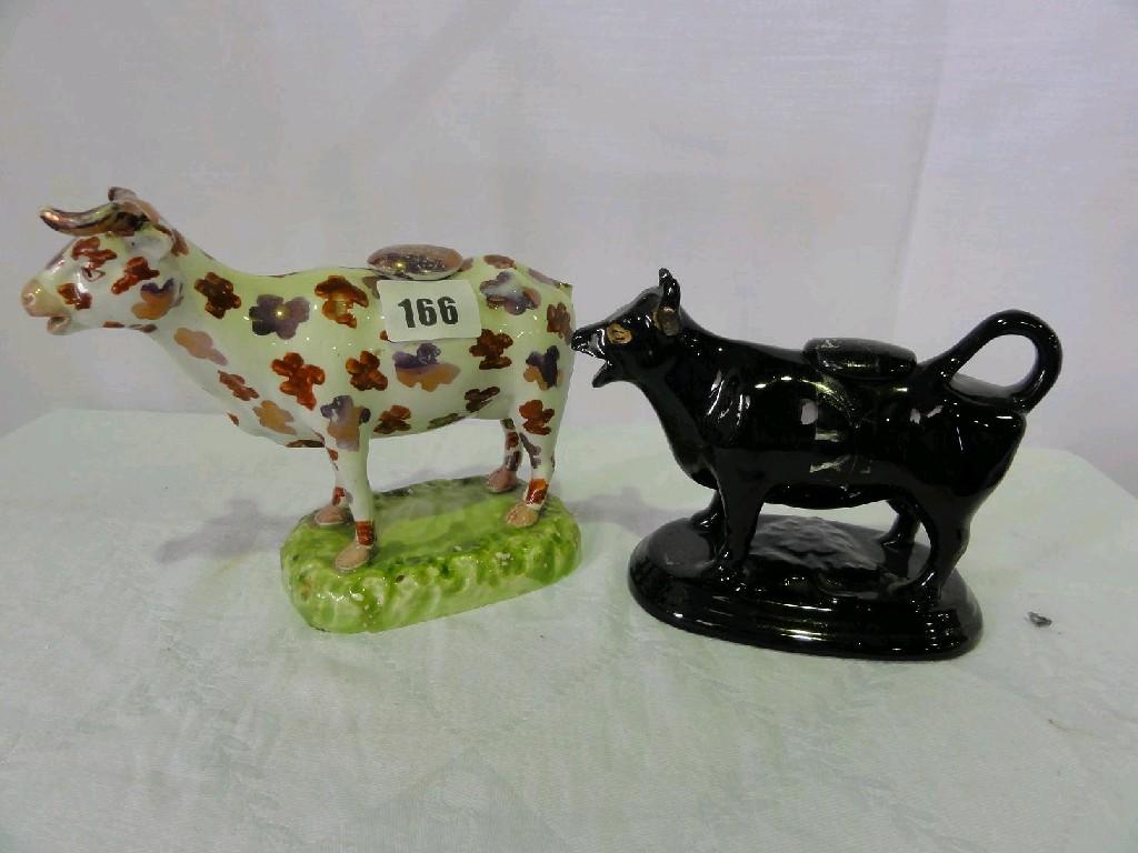 Appraisal: An early th century cow creamer with purple lustred and