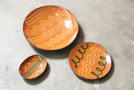 Appraisal: THREE CONTEMPORARY REDWARE PLATES All by Greg Shooner and Oval