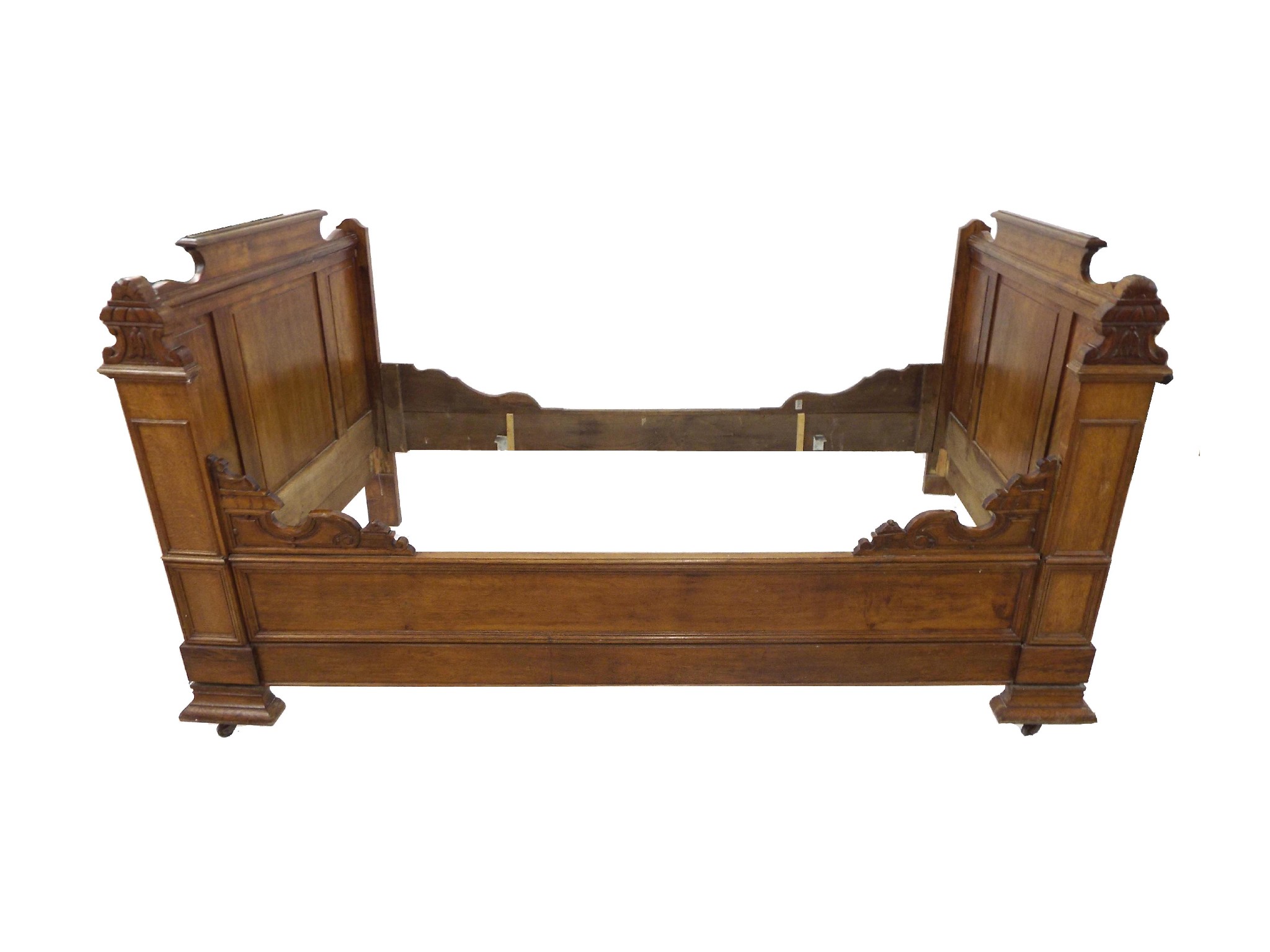 Appraisal: Interesting French oak ecclesiastical type sleigh single bed decorated with