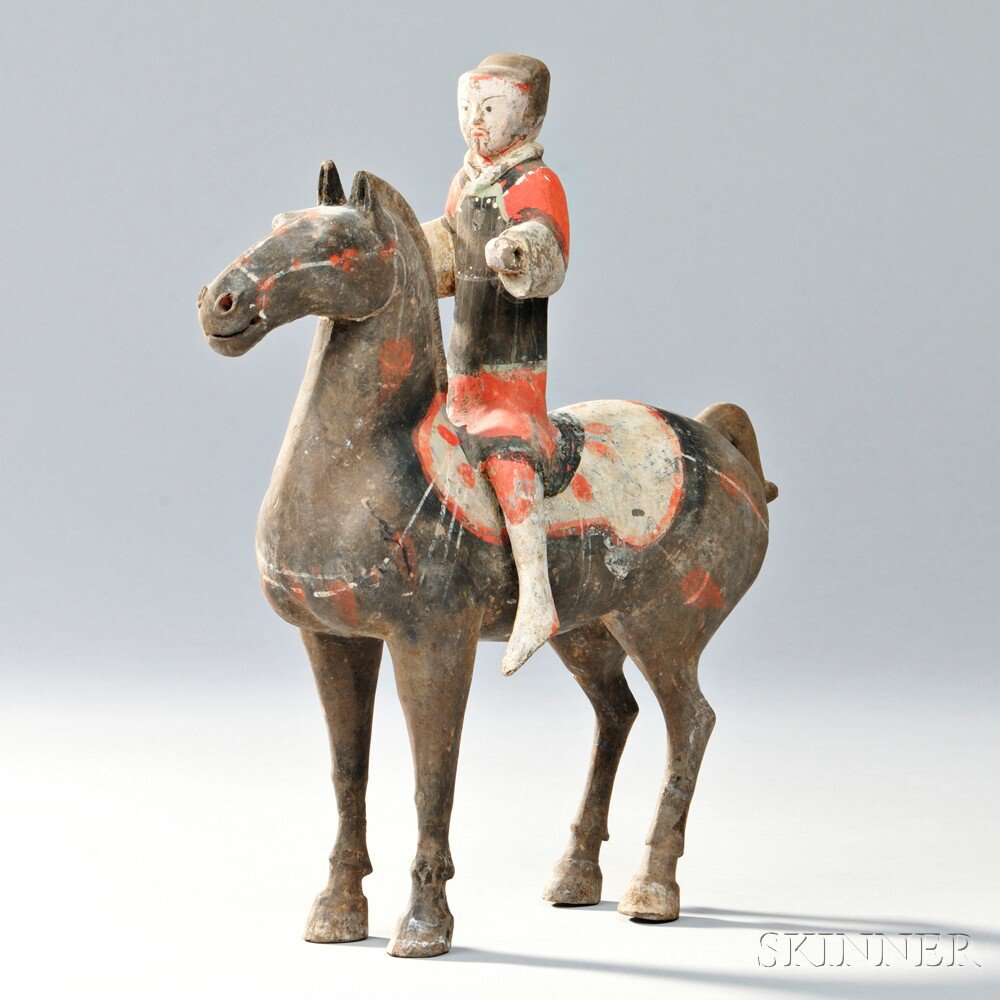 Appraisal: Gray Pottery Figure of an Equestrian China Han dynasty the