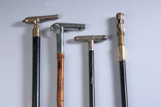 Appraisal: FOUR GADGET CANES Flashlight with hallmarks ebony handle horn tip