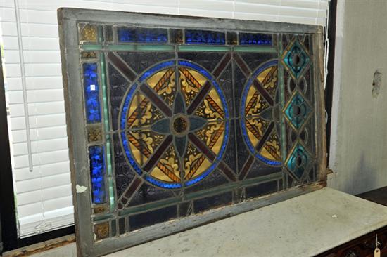 Appraisal: STAINED GLASS WINDOW Large polychrome window with geometric and foliate