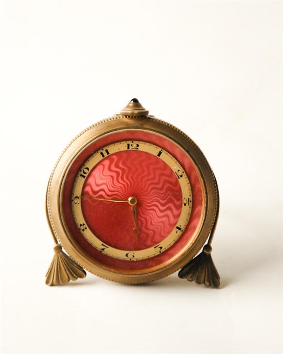 Appraisal: An E th C Continental Clock round rose-colored dial housed