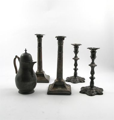 Appraisal: A pair of George III silver candlesticks of stylised Corinthium