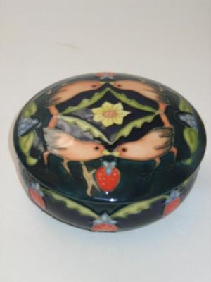 Appraisal: A MOORCROFT POTTERY POWDER BOWL of circular form tube lined