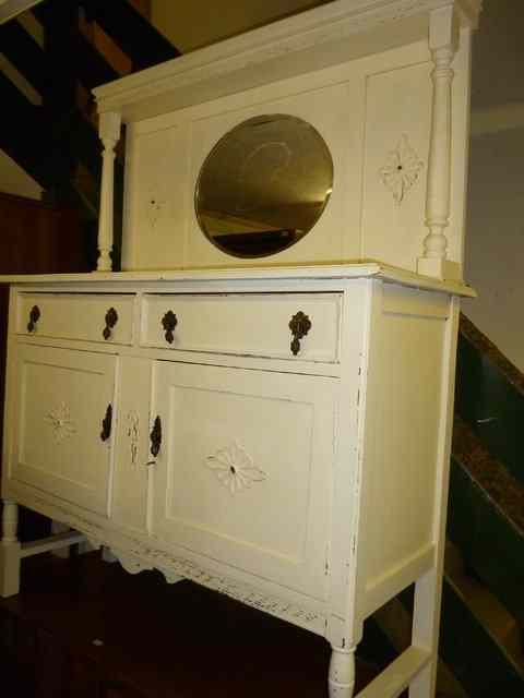 Appraisal: A WHITE PAINTED DRESSER the plate rack back over two