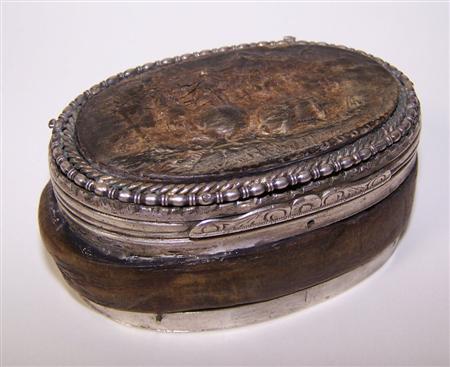 Appraisal: An unusual pressed horn snuff box unmarked of oval outline