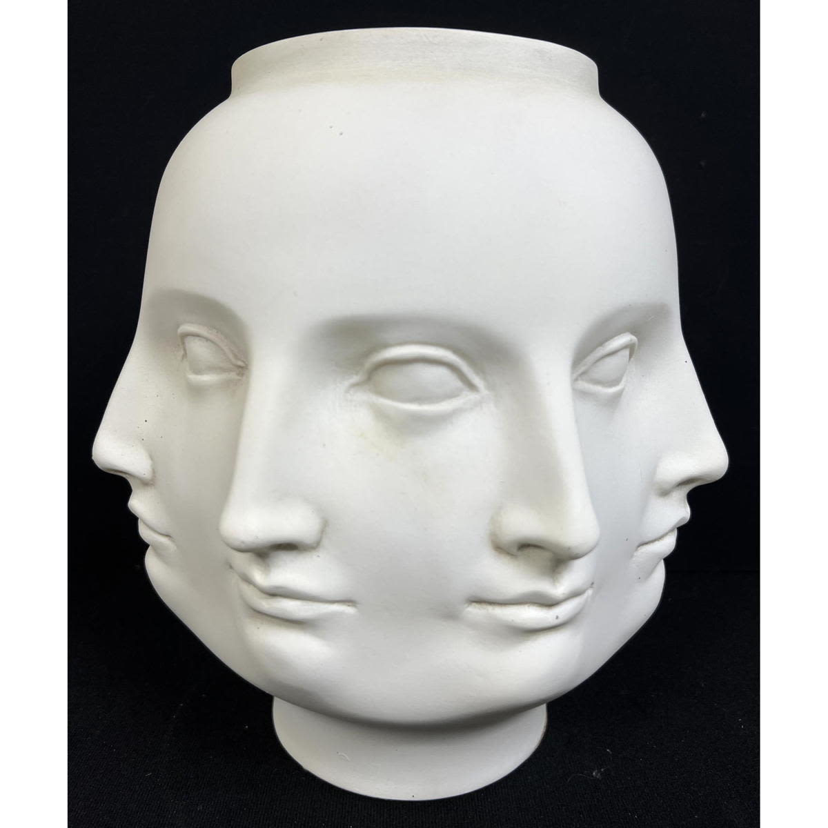 Appraisal: Fornasetti style TMS Molded Resin Perpetual Face Vase Jonathan Adler