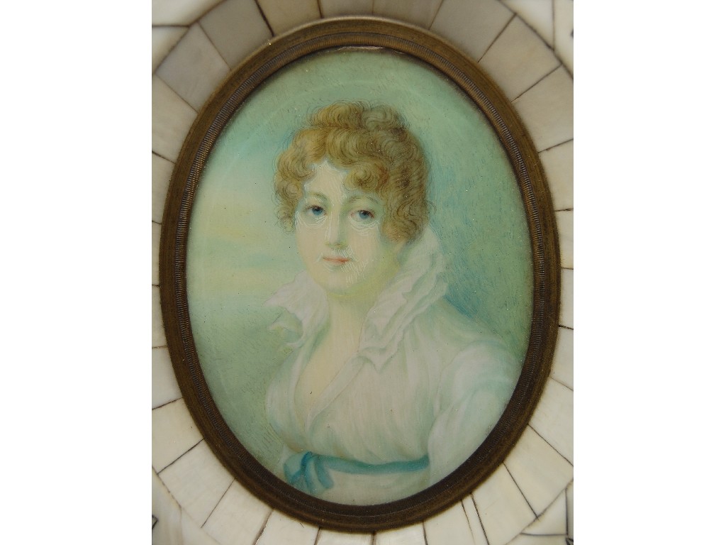 Appraisal: Oval portrait miniature of a young lady in Regency costume