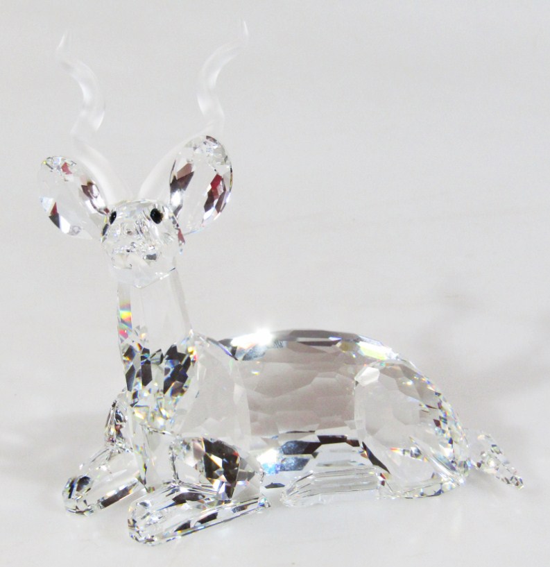 Appraisal: A Swarovski Crystal recumbent stag cm high boxed with paperwork