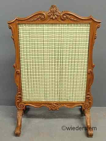 Appraisal: Continental style carved fruitwood fire screen ''h x ''w