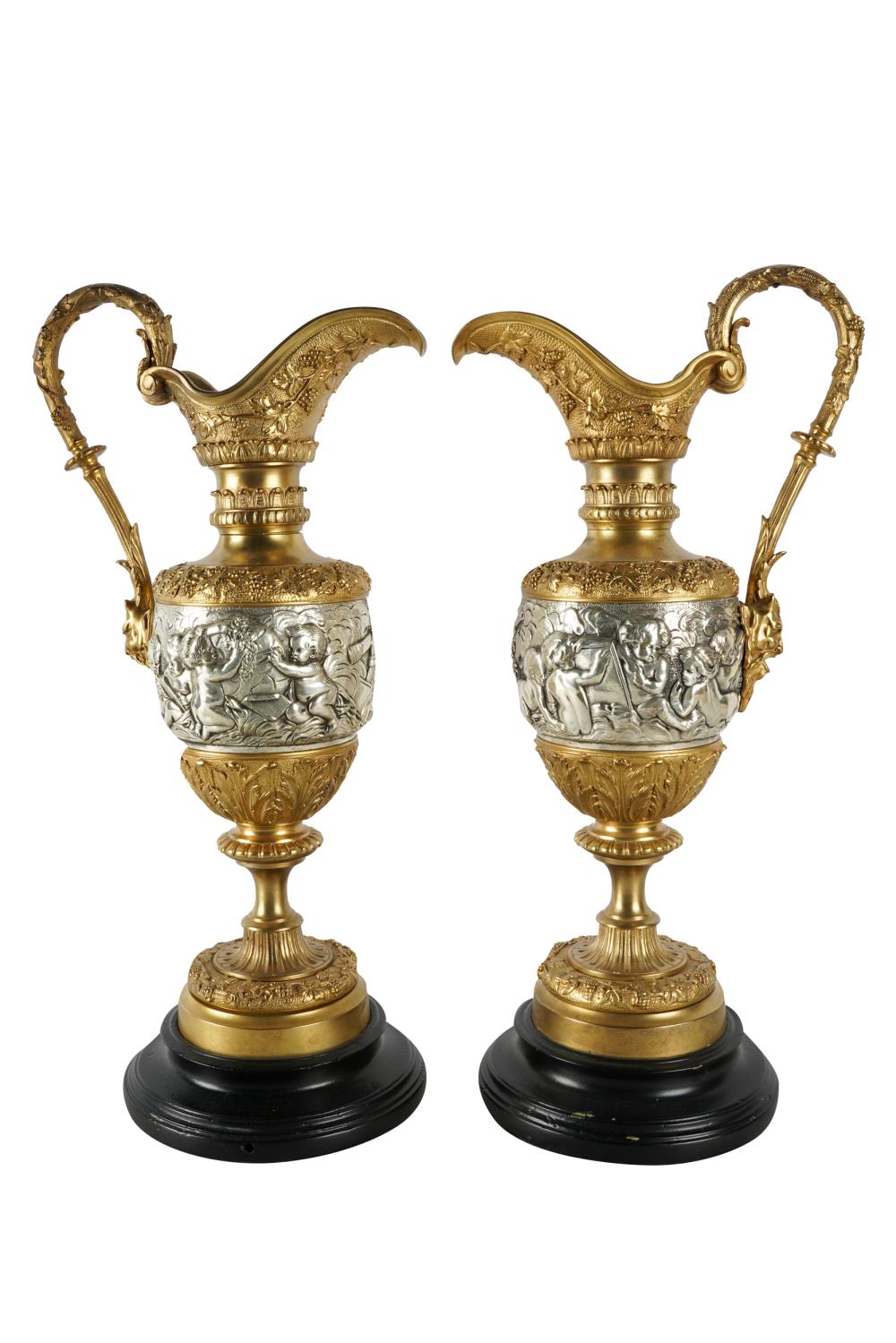 Appraisal: PAIR OF GILT SILVER GILT EWERSin the Neoclassic style drilled