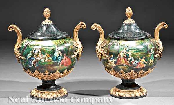 Appraisal: A Pair of Decorative Polychrome and Gilt Covered Urns th