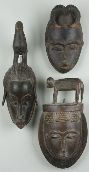 Appraisal: Three African Masks the first mask possibly from the Baule