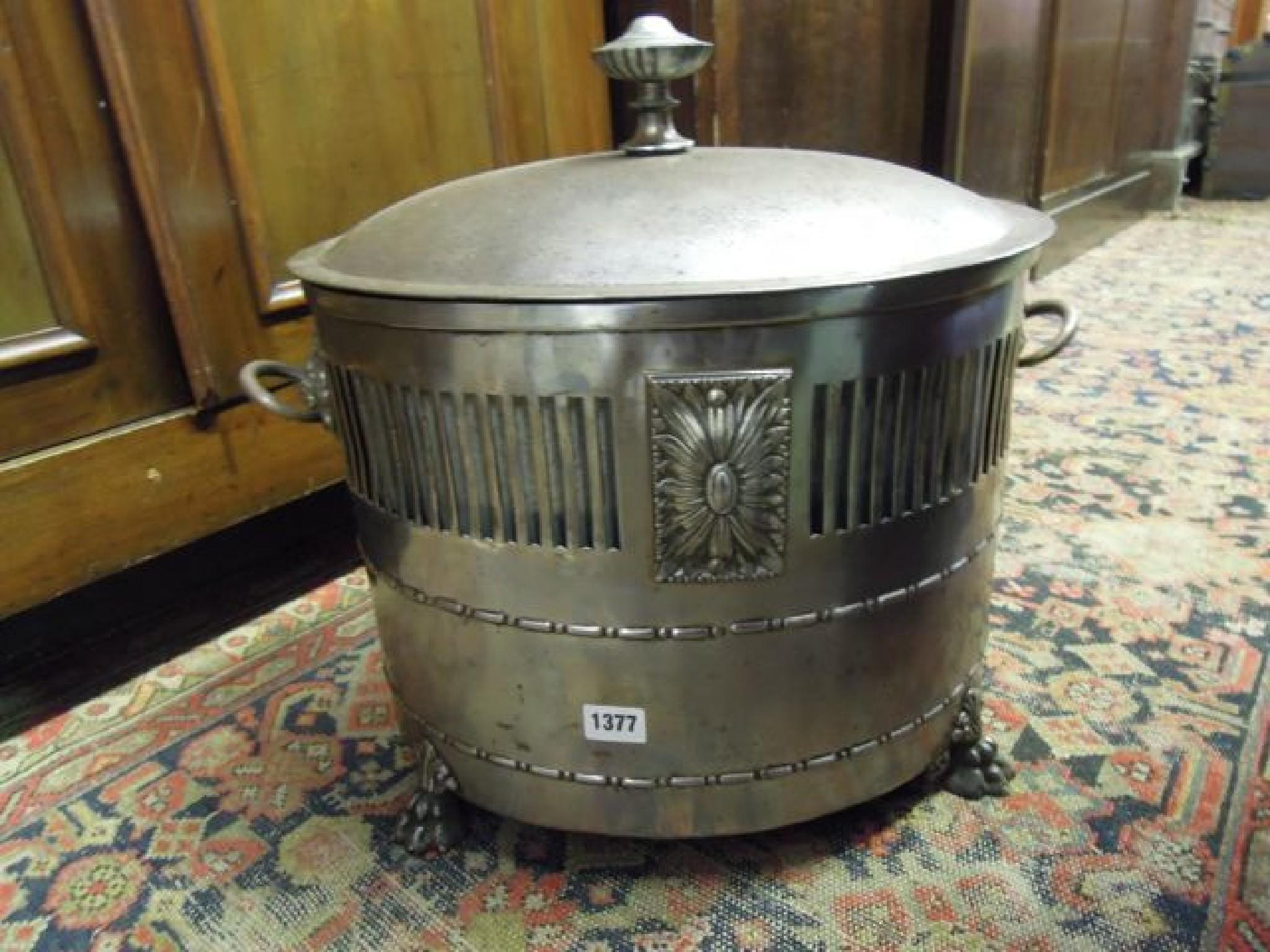 Appraisal: A Regency style steel coal bin of oval form with