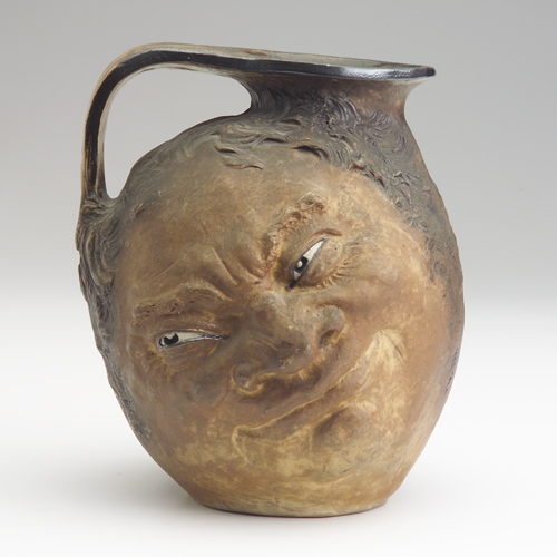 Appraisal: MARTIN BROTHERS Large double stoneware face jug in dead-matte browns