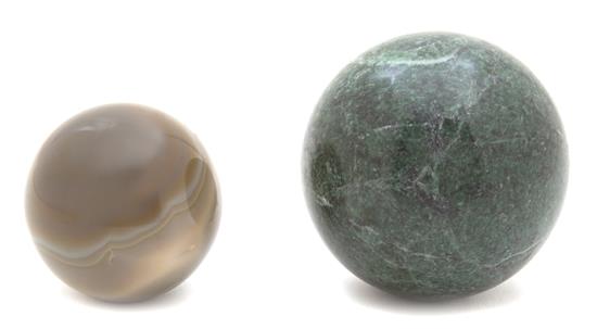 Appraisal: Sale Lot Two Round Hardstones Spheres th century one large