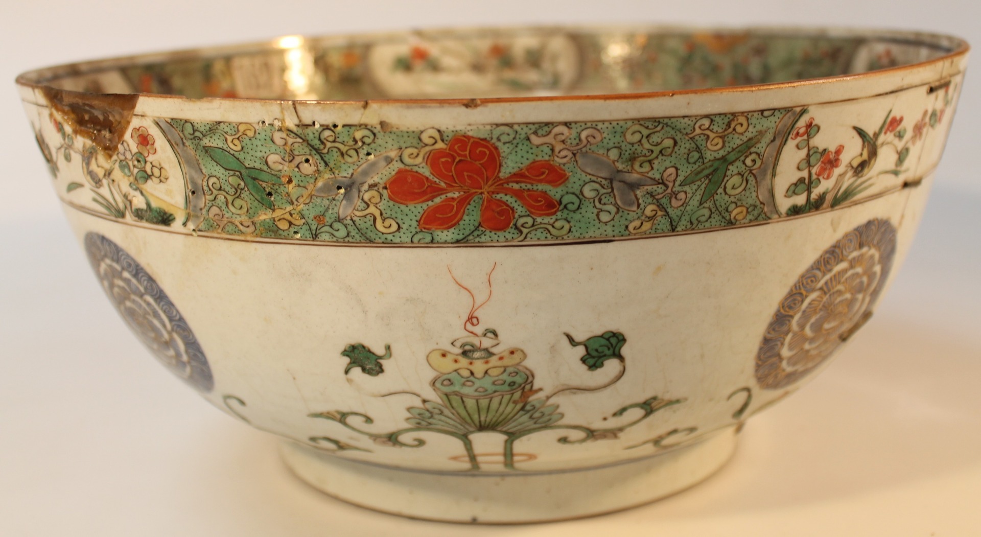 Appraisal: A Chinese porcelain polychrome decorated bowl the circular body set