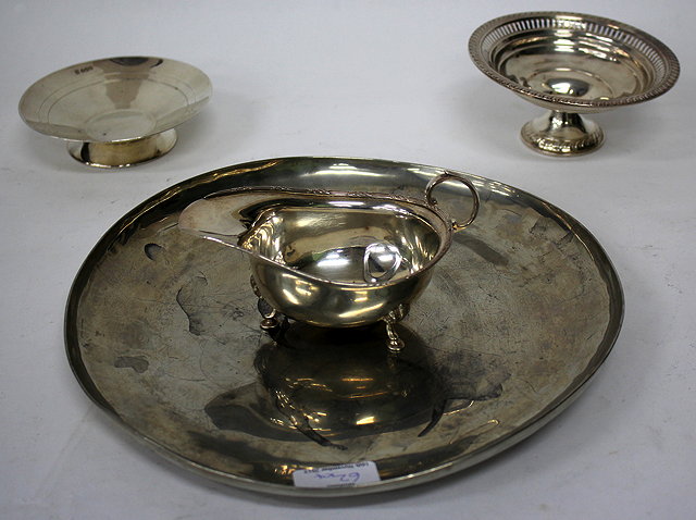 Appraisal: TWO SMALL SILVER DISHES a silver sauceboat and a white