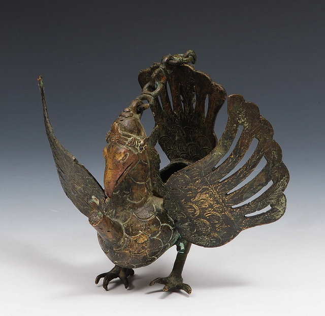 Appraisal: A Javanese garuda hanging bird lamp cm