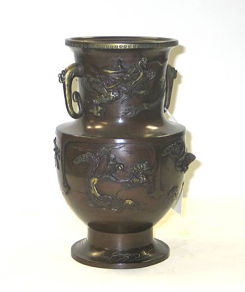 Appraisal: A patinated bronze vase The body decorated with four scenes