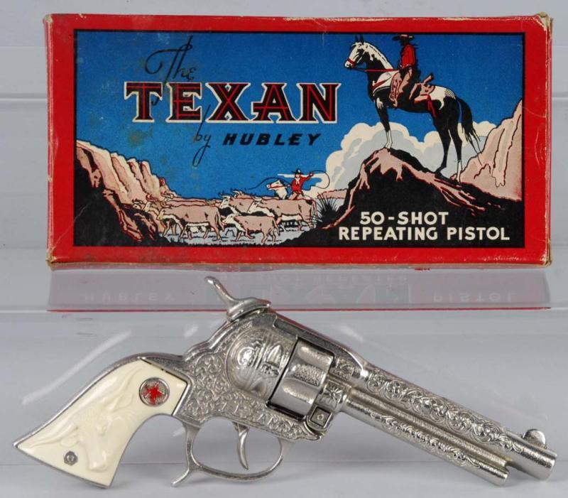 Appraisal: Hubley Texan Cap Gun Description Includes box Toy Near Mint