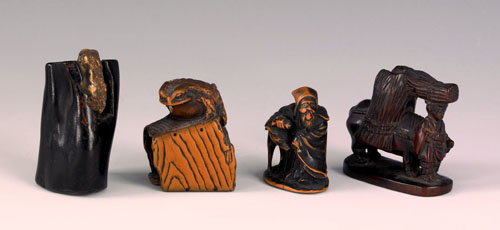 Appraisal: Four Japanese carved boxwood netsuke th c to include a