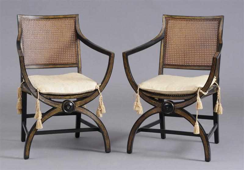 Appraisal: PAIR OF REGENCY STYLE CARVED BLACK LACQUER AND PARCEL-GILT CURULE