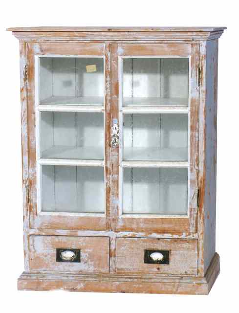 Appraisal: A DISTRESSED PINE CABINET with two glazed panelled doors over