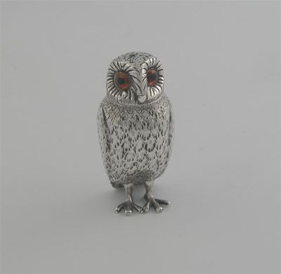 Appraisal: A Victorian cast model of an owl with textured plumage