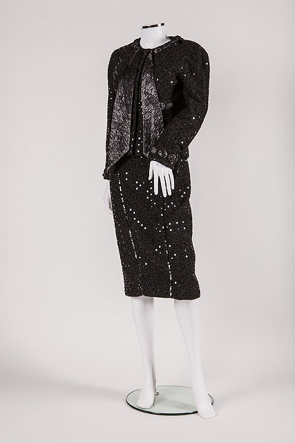 Appraisal: A black sequinned Chanel two piece cocktail suit from the