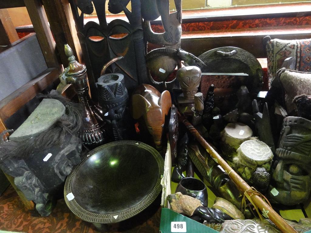 Appraisal: A large quantity of African wooden carved items including masks