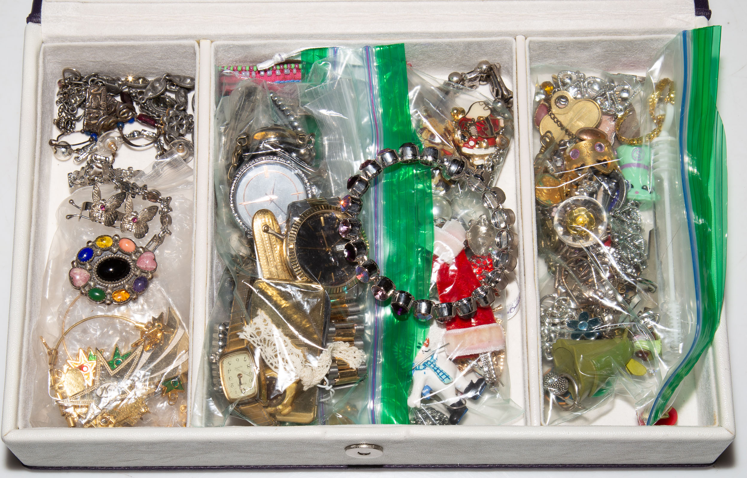 Appraisal: A BOX OF JEWELRY Includes necklaces bracelets watches earrings pins