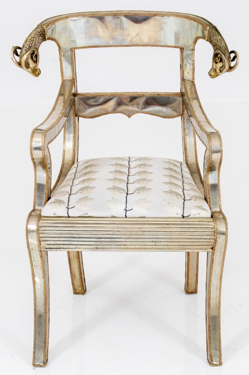 Appraisal: ANGLO-INDIAN STYLE SILVERED RAM'S HEAD ARMCHAIR Anglo-Indian style silvered metal-veneered