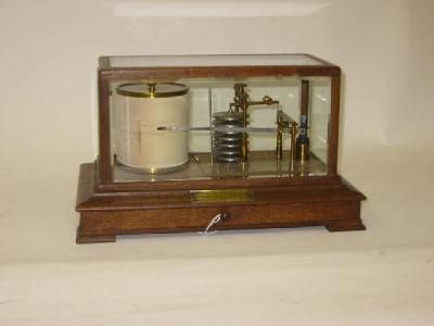 Appraisal: AN OAK CASED BAROGRAPH the clockwork operated graph drum with