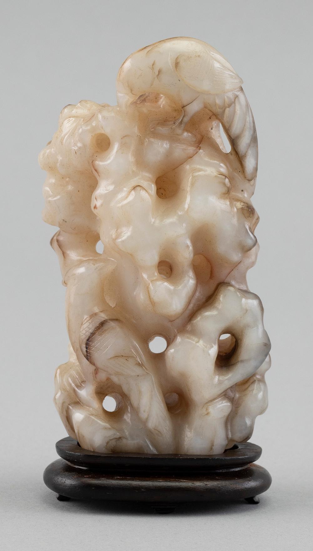 Appraisal: CHINESE CARVED CHICKEN BONE JADE FIGURE GROUP HEIGHT WITH WOOD