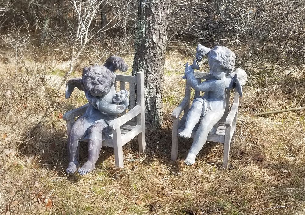 Appraisal: Pair of Lead Bacchus Cherub Garden Figure Sculptures th Century