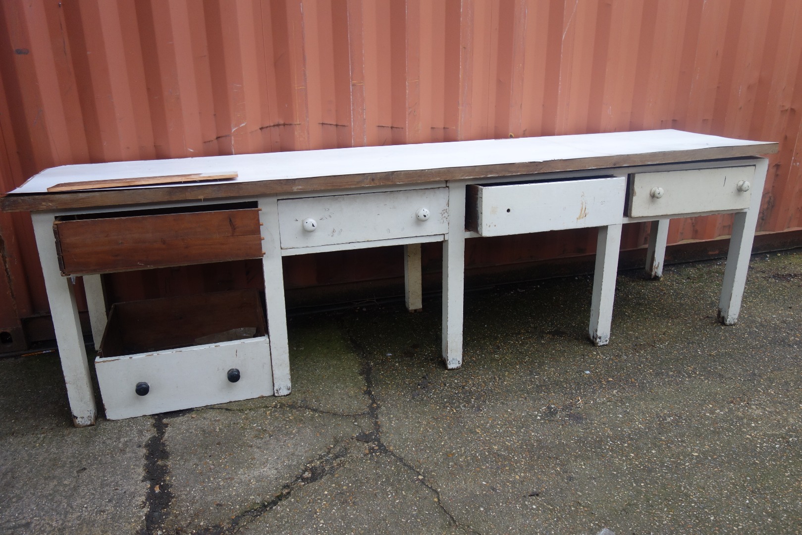 Appraisal: A late Victorian white painted pine four drawer serving table