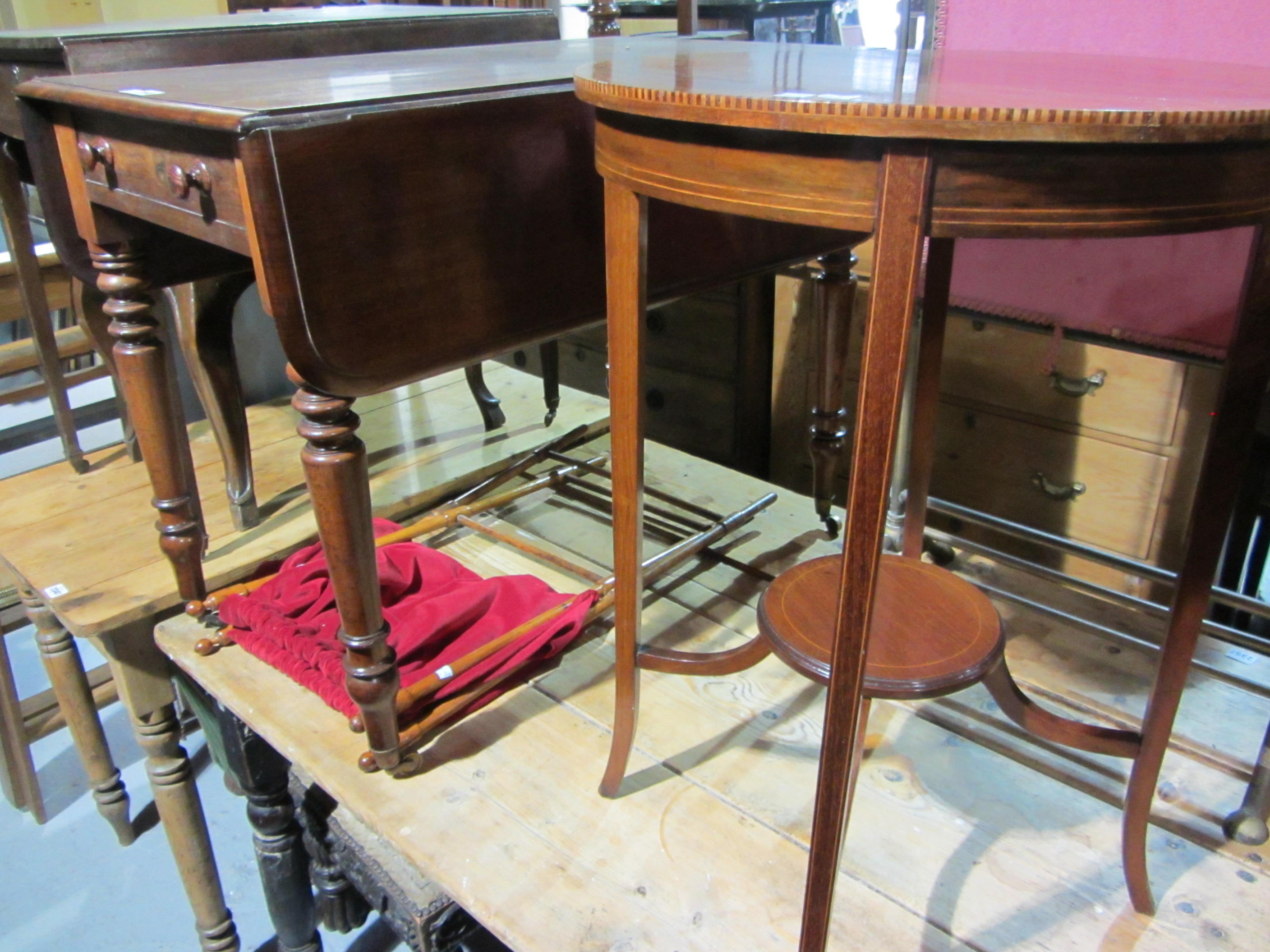 Appraisal: A Victorian mahogany drop flap table together with an Edwardian