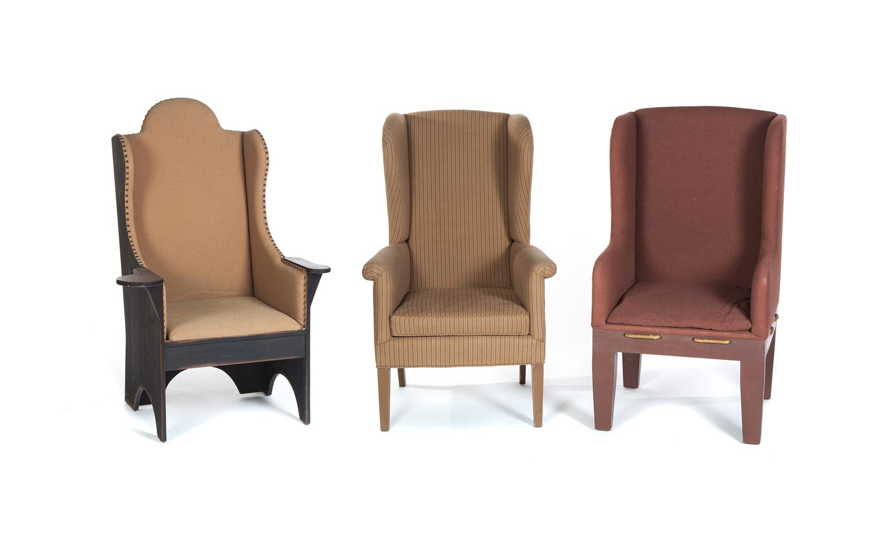 Appraisal: THREE CONTEMPORARY WINGBACK ARMCHAIRS Late th century Country-style wingbacks Wood