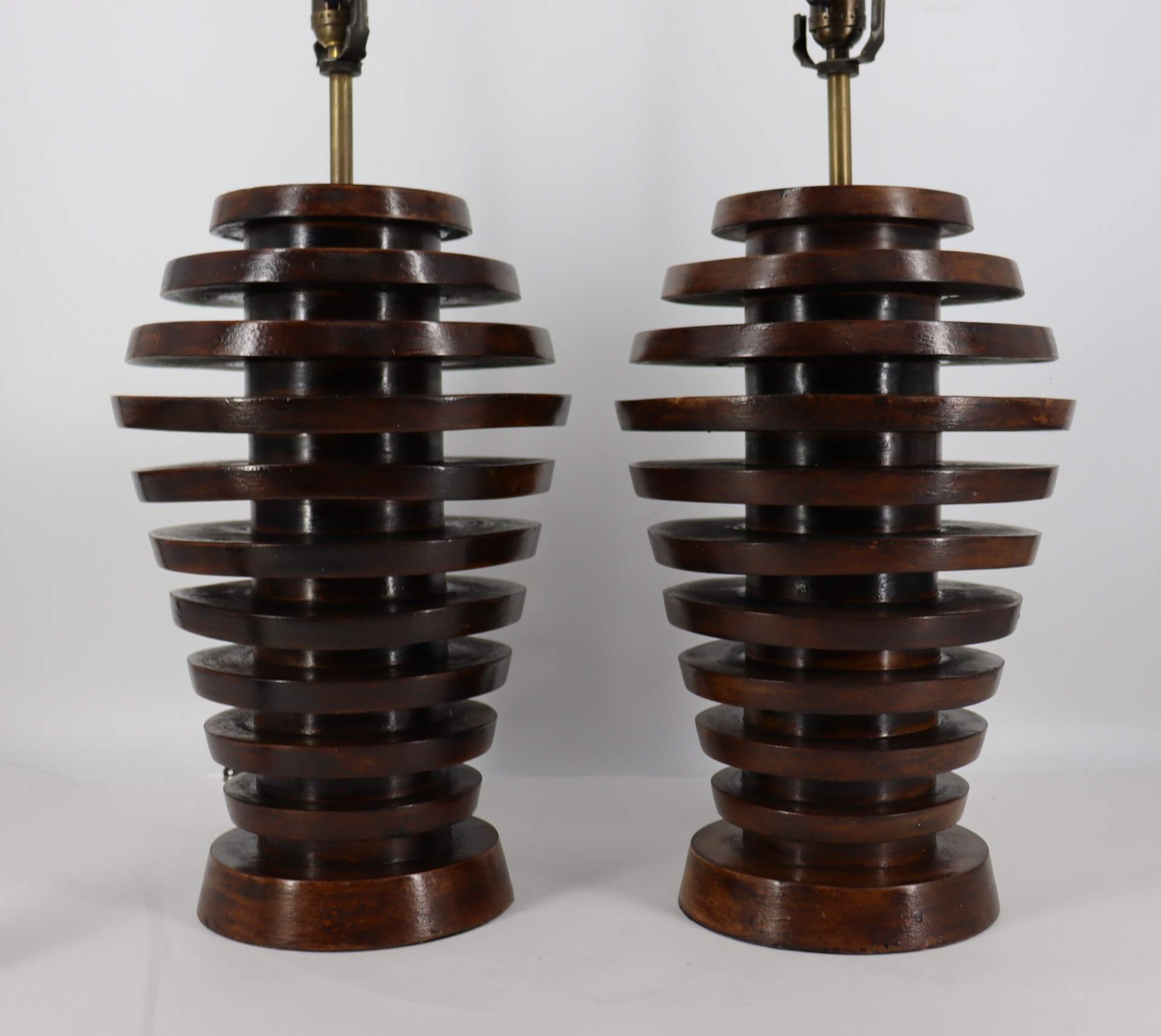 Appraisal: A VINTAGE PAIR OF WOOD SPIRAL LAMPS From a Dobbs