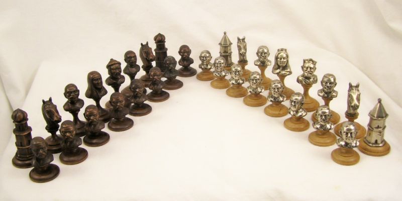 Appraisal: Figural Chess Set Figural chess set depicting English and Asian